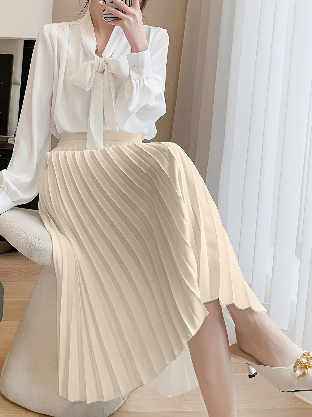 Luna’s Graceful Echo Pleated Midi Skirt